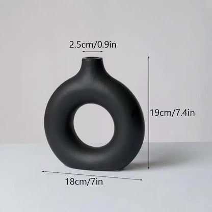 Minimalist white ceramic donut vase set living room