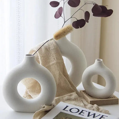 Minimalist white ceramic donut vase set living room