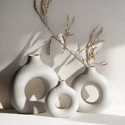 Minimalist white ceramic donut vase set living room