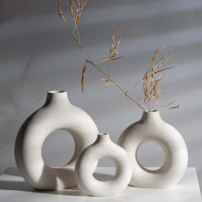 Minimalist white ceramic donut vase set living room