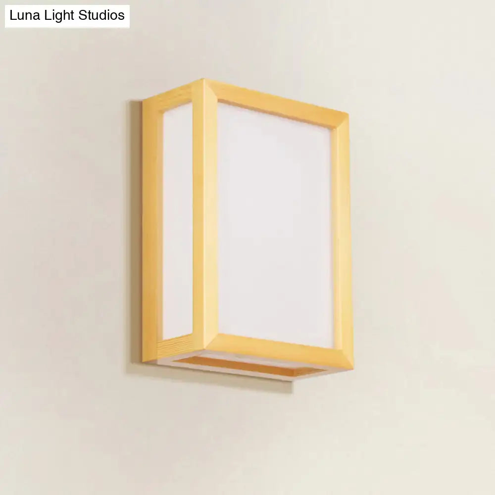 Minimalist white glass wall sconce with wooden frame for corridors