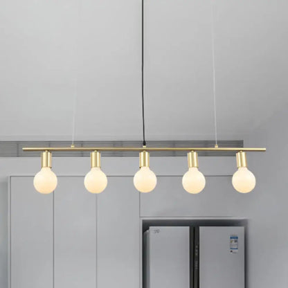 Minimalist white & gold linear metal island lighting dining room