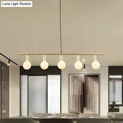 Minimalist white & gold linear metal island lighting dining room