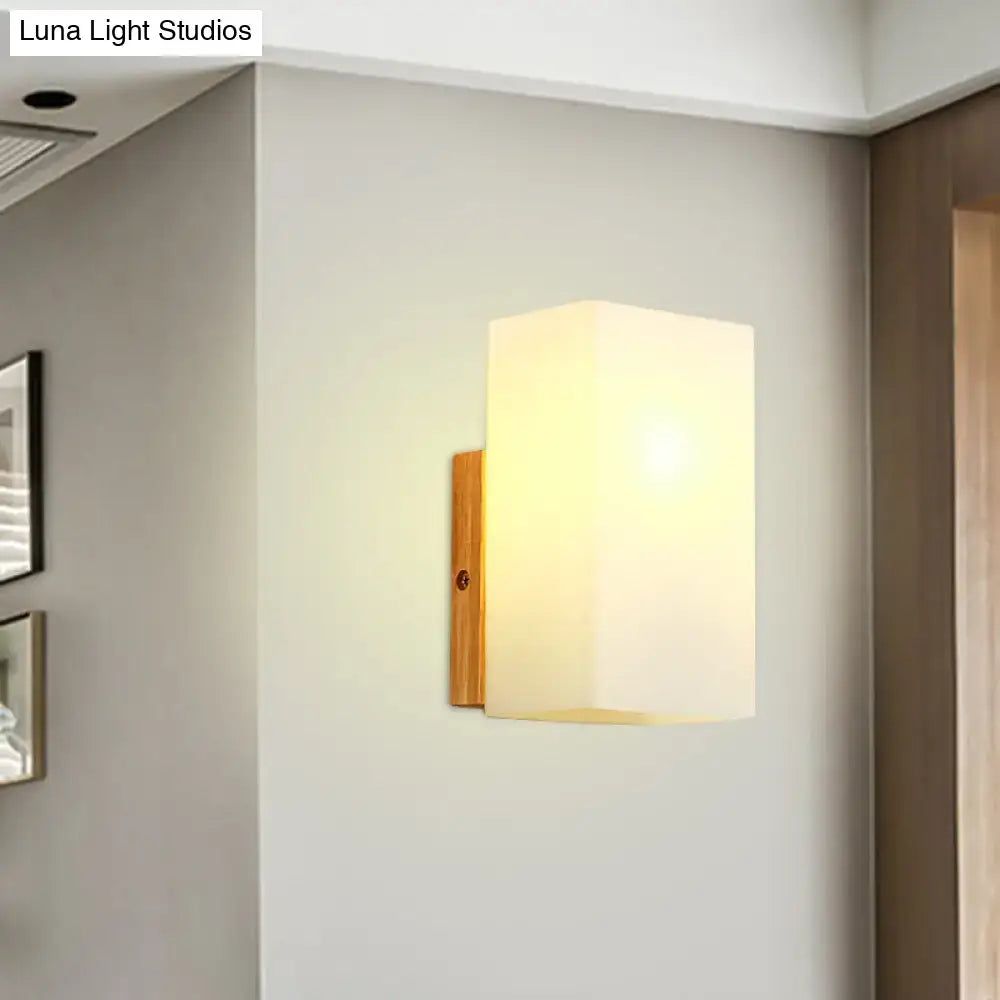 Minimalist wood and opal glass wall sconce bedroom light
