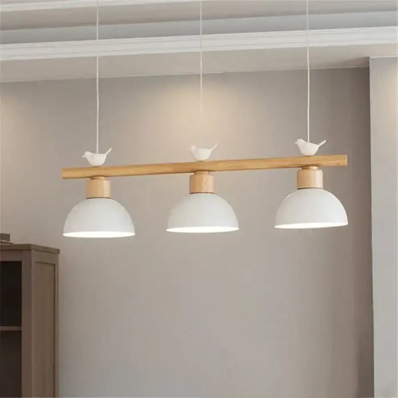 Minimalist wood and white bird light pendant dining room
