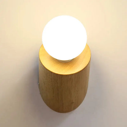 Minimalist wood wall lamp with frosted bulb for bedroom or living room