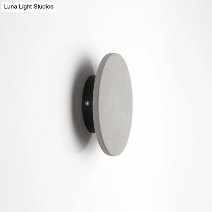 DecorBites™ Minimalistic Cement Grey LED Wall Sconce Light for Bedside - Flat Round Wall Mount
