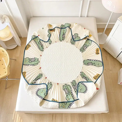 Mint green dinosaur summer quilt and latex fitted sheet set bedroom