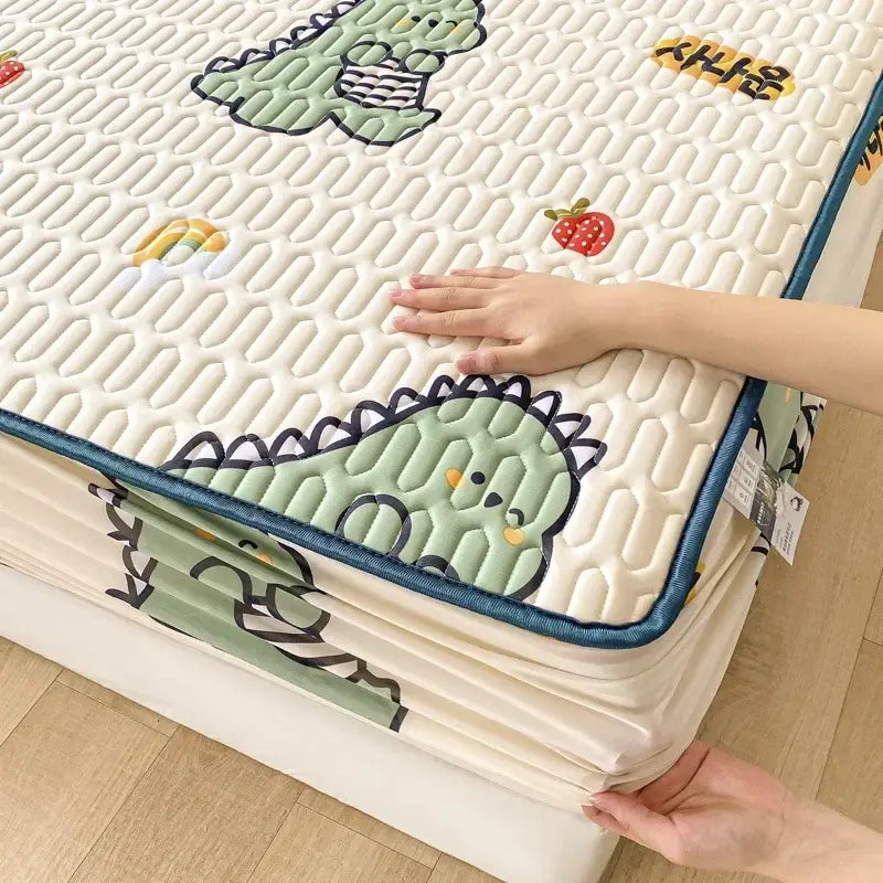 Mint green dinosaur summer quilt and latex fitted sheet set bedroom