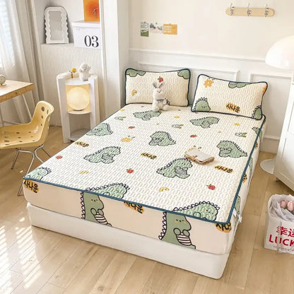Mint green dinosaur summer quilt and latex fitted sheet set bedroom