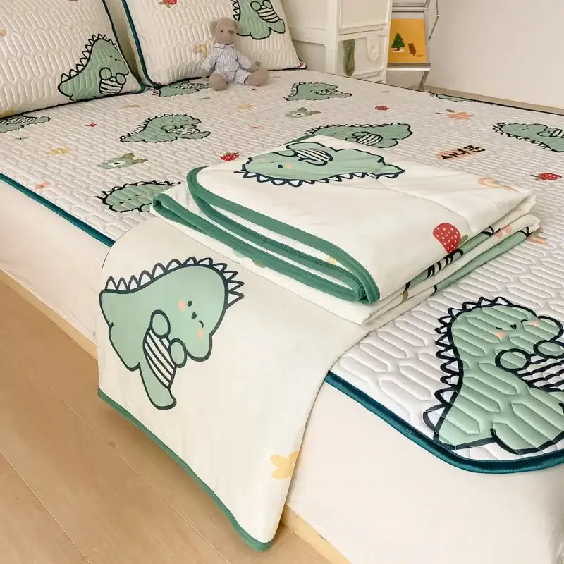 Mint green dinosaur summer quilt and latex fitted sheet set bedroom