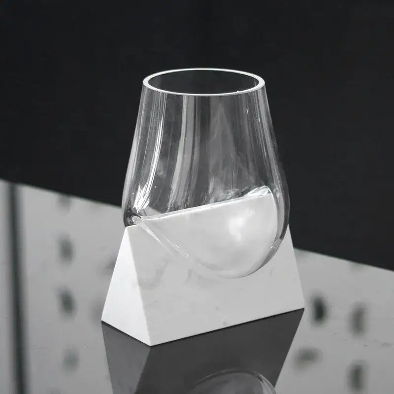 Modern abstract glass vase with white marble base living room decor