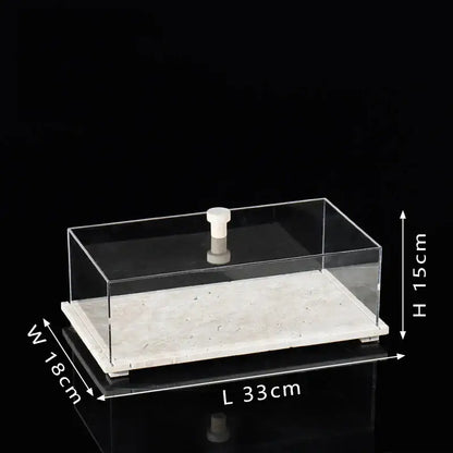 Modern acrylic display case with travertine base for dining room