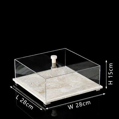 Modern acrylic display case with travertine base for dining room
