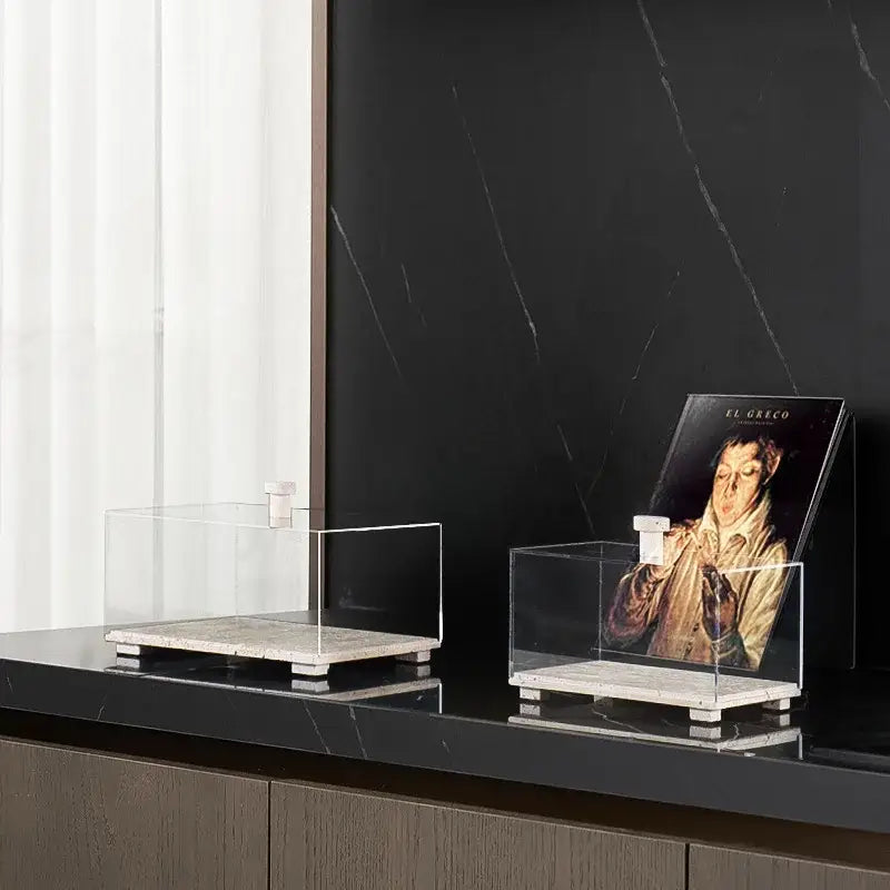 Modern acrylic display case with travertine base for dining room