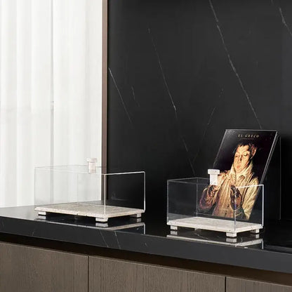 Modern acrylic display case with travertine base for dining room