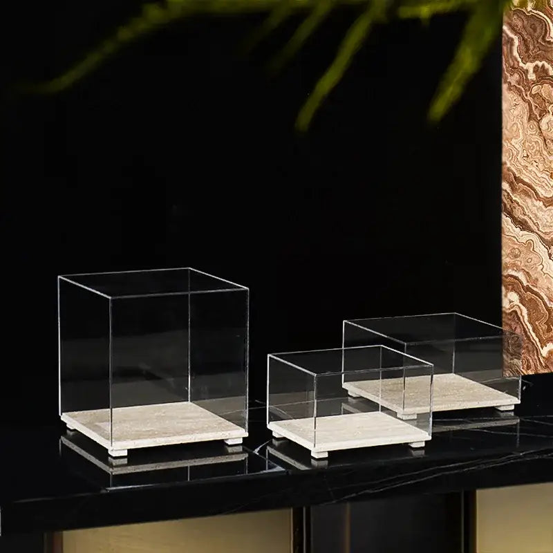 Modern acrylic display case with travertine base for dining room