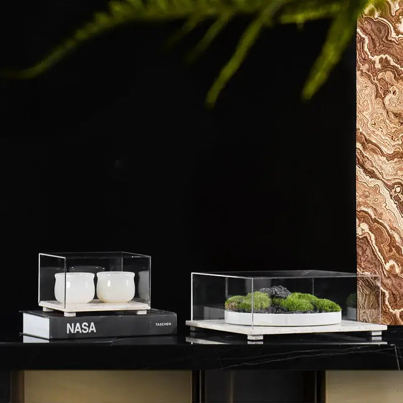 Modern acrylic display case with travertine base for dining room