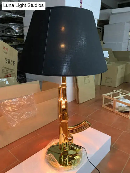 Modern ak47 gun lounge floor lamp – gold & black bedroom light