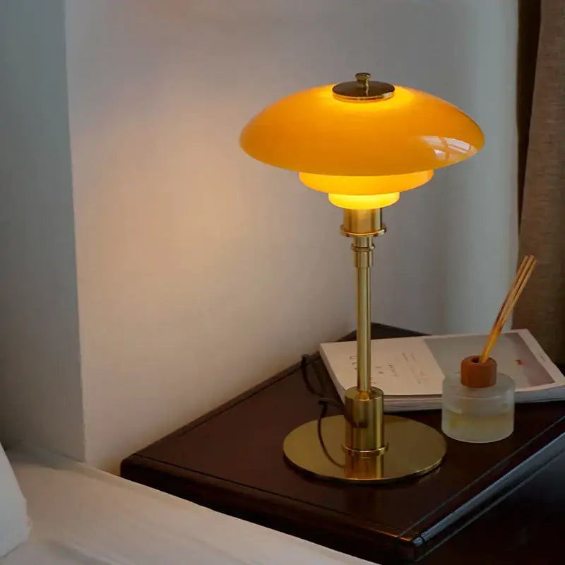 Modern amber glass desk lamp for home office with brass base