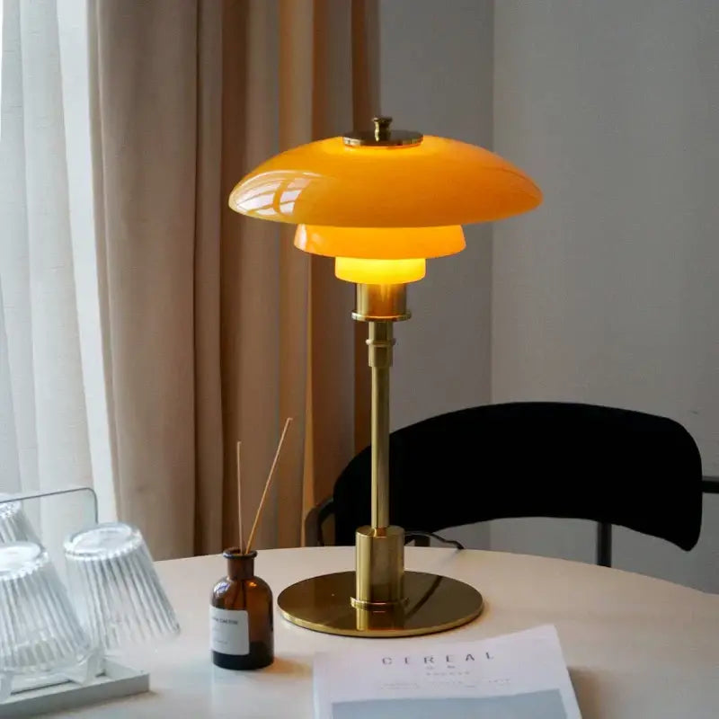 Modern amber glass desk lamp for home office with brass base