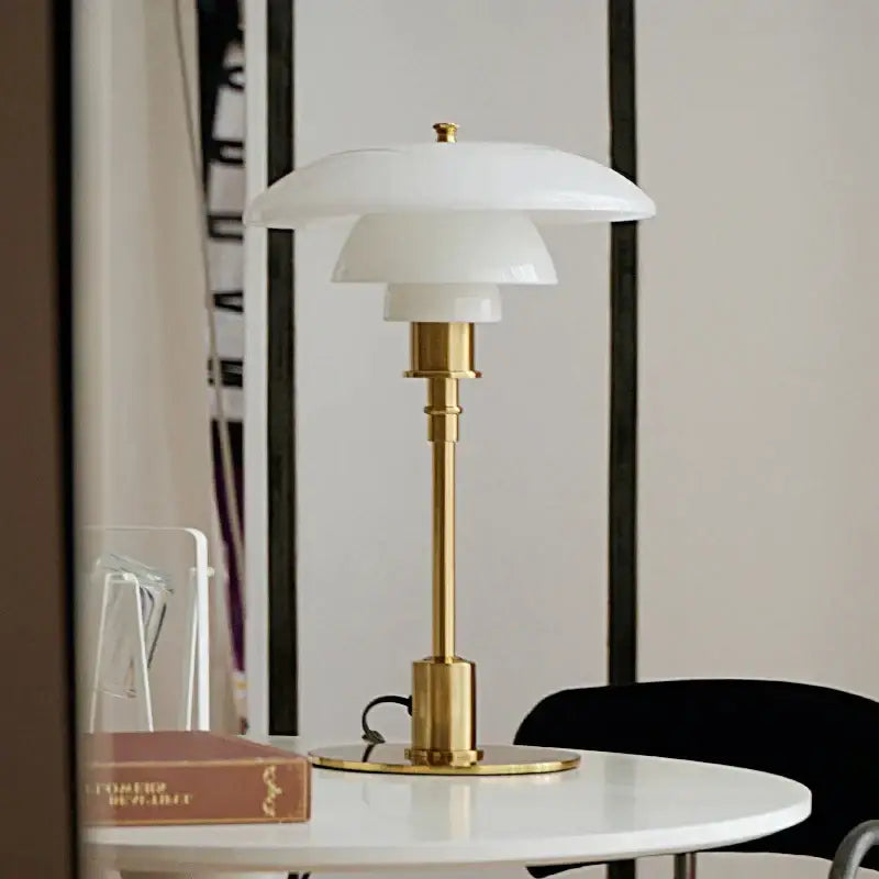 Modern amber glass desk lamp for home office with brass base