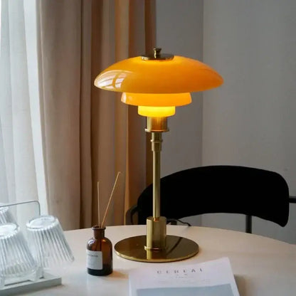 Modern amber glass desk lamp for living room with golden brass finish