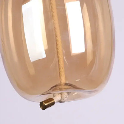 Modern amber glass pendant light bedroom gold accents