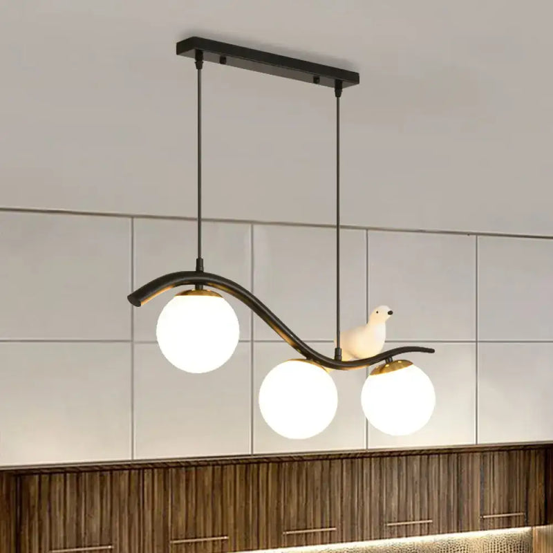 Modern black 3 light dining room pendant with clear white glass ball shade
