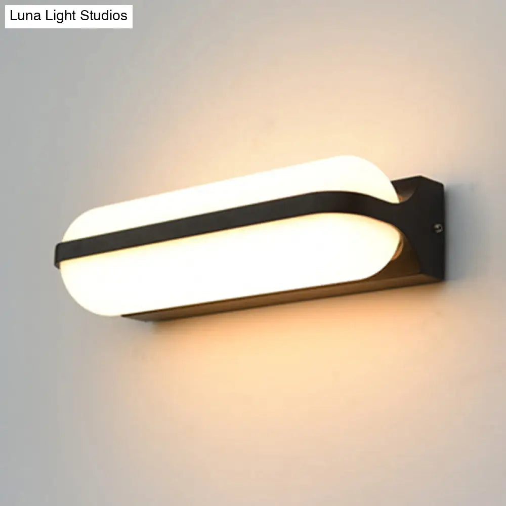 DecorBites™ Modern Black Acrylic Wall Sconce with Flush Capsule Design and Half-Bulb Mounting
