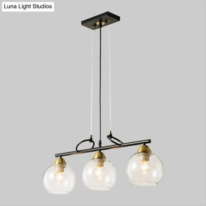 Modern black and brass 3-bulb smoke gray glass pendant dining hall island