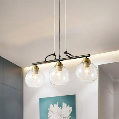 Modern black and brass 3-bulb smoke gray glass pendant dining hall island