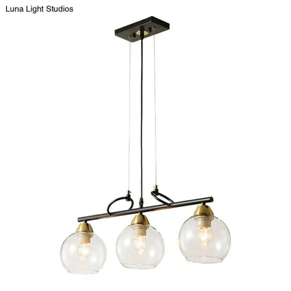 Modern black and brass 3-bulb smoke gray glass pendant dining hall island