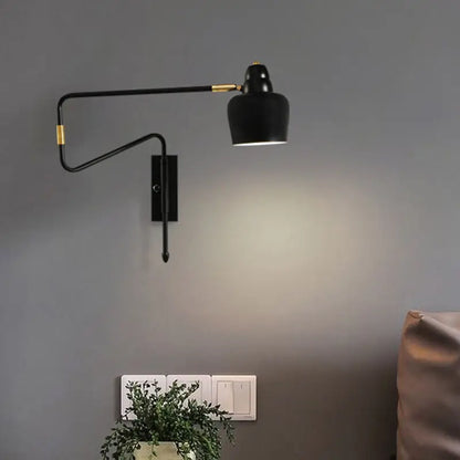 Modern black and brass retractable arm reading lamp bedroom light