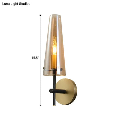 Modern black and brass wall mount light for study room