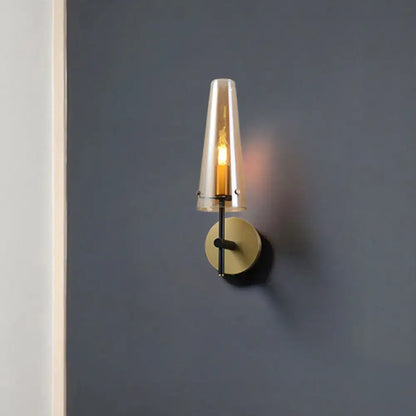 Modern black and brass wall mount light for study room
