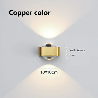 Modern black and copper bedroom wall lamp with glass dome