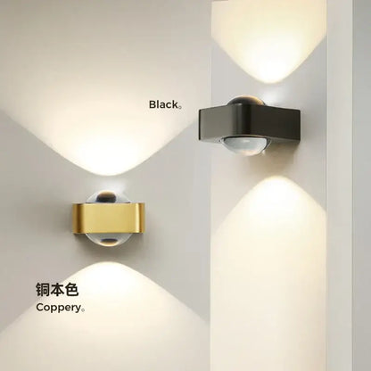 Modern black and copper bedroom wall lamp with glass dome