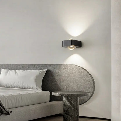 Modern black and copper bedroom wall lamp with glass dome