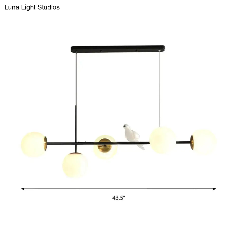 Modern black and gold 5-light island pendant – dining room glass sphere