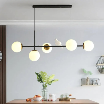 Modern black and gold 5-light island pendant – dining room glass sphere