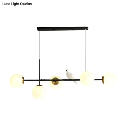 Modern black and gold 5-light island pendant – dining room glass sphere