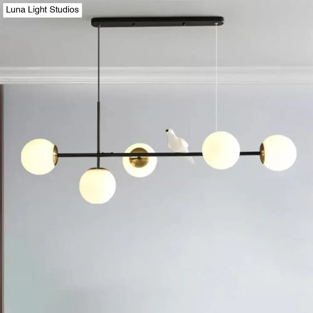 Modern black and gold 5-light island pendant – dining room glass sphere