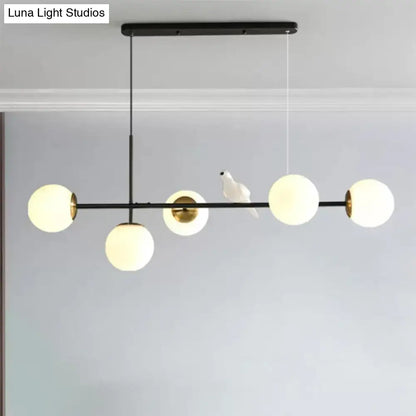 Modern black and gold 5-light island pendant – dining room glass sphere