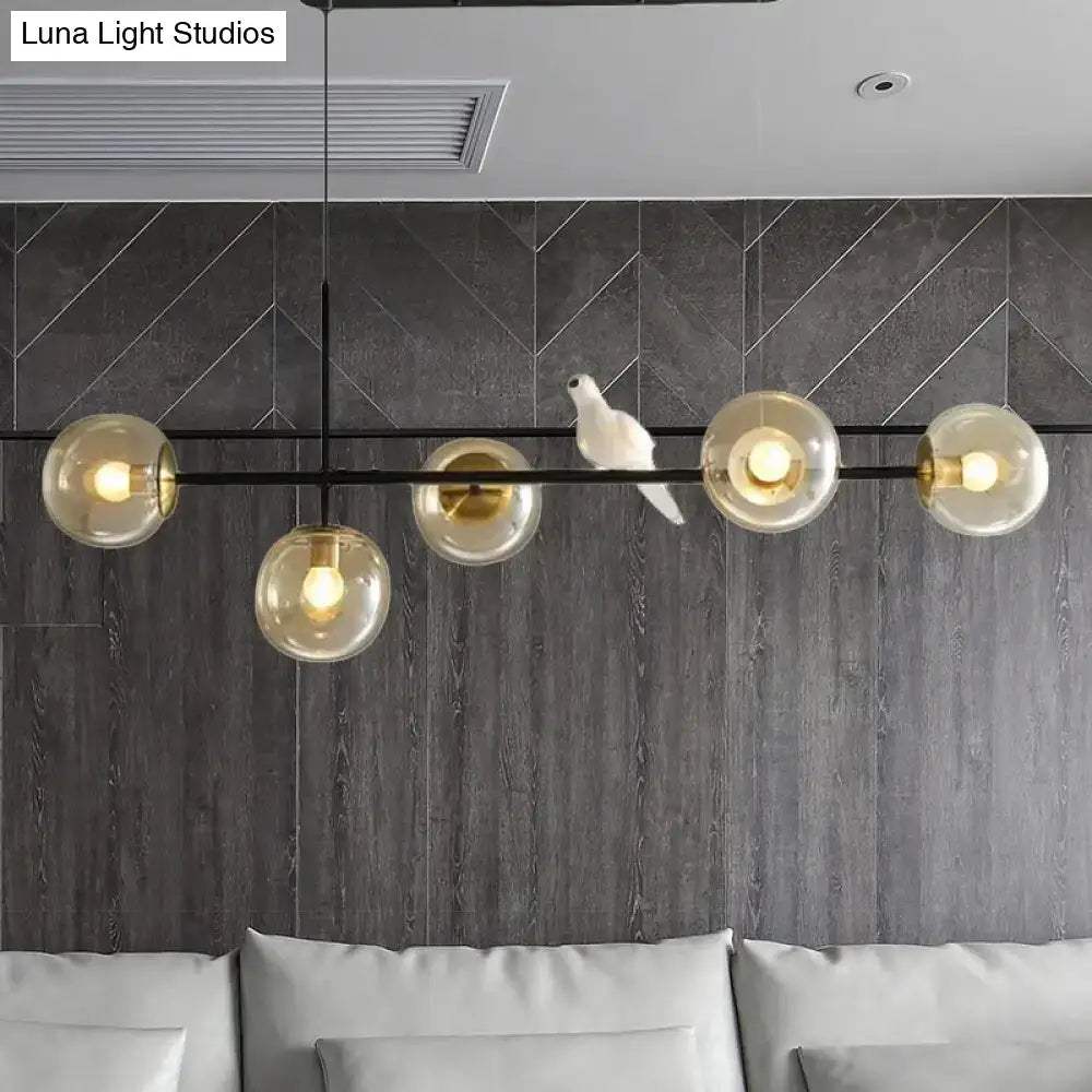 Modern black and gold 5-light island pendant – dining room glass sphere