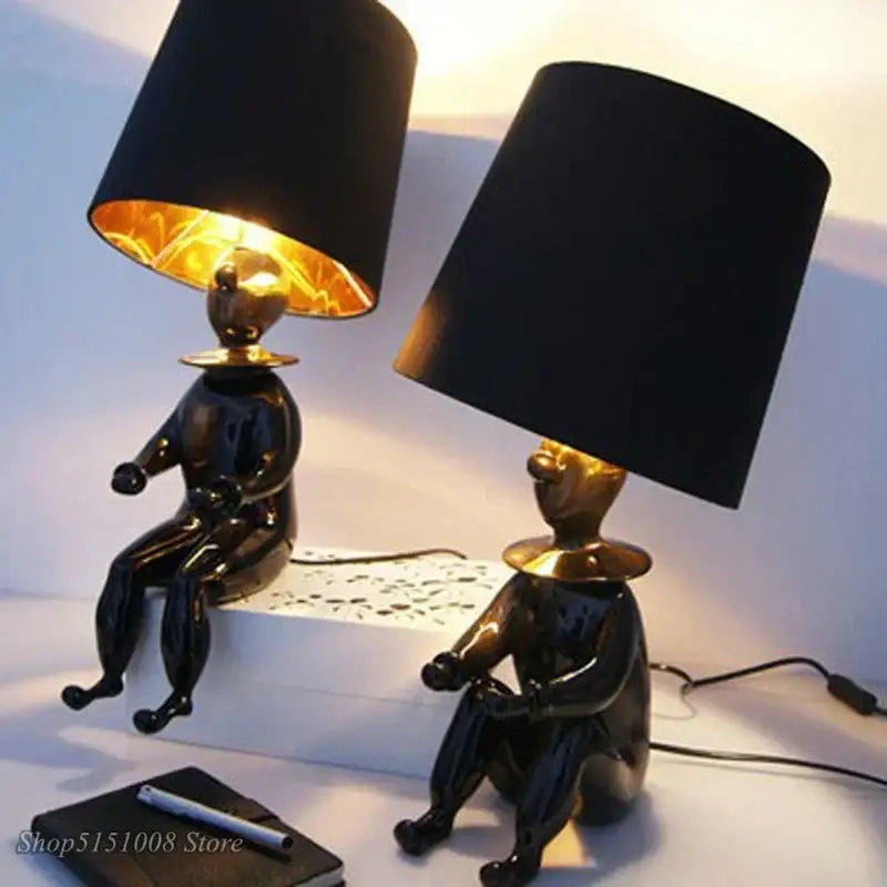 Modern black and gold ceramic clown desk lamp bedroom light