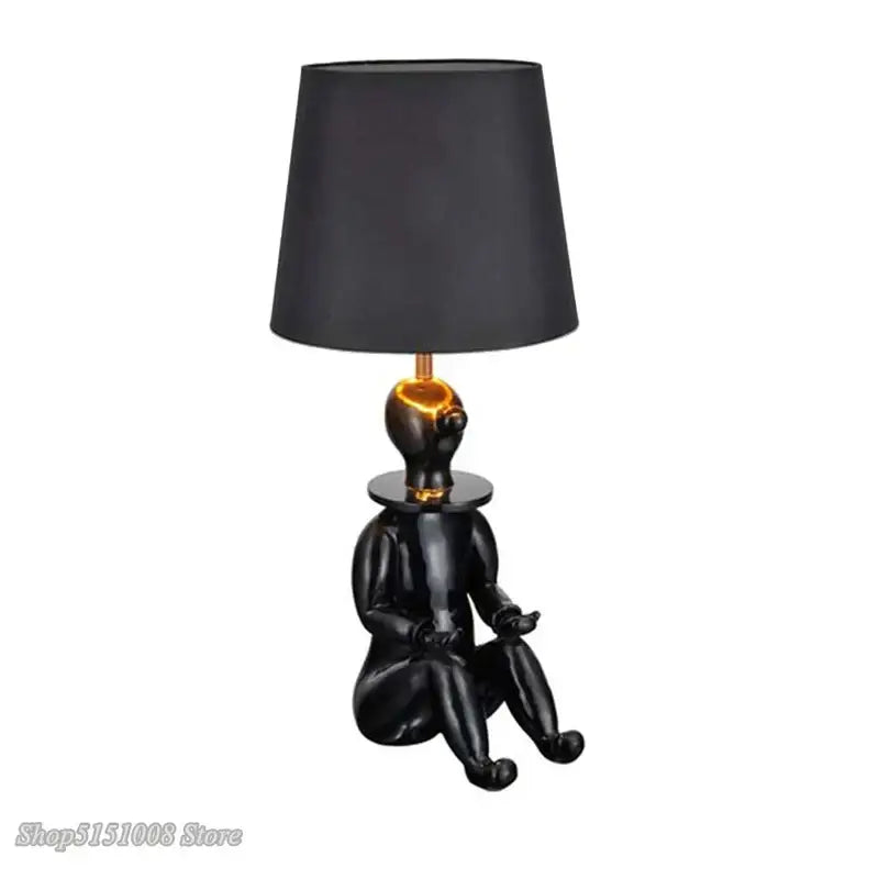 Modern black and gold ceramic clown desk lamp bedroom light