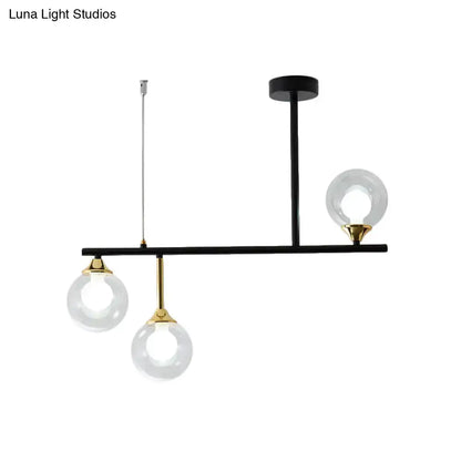 Modern black and gold globe pendant light for dining room