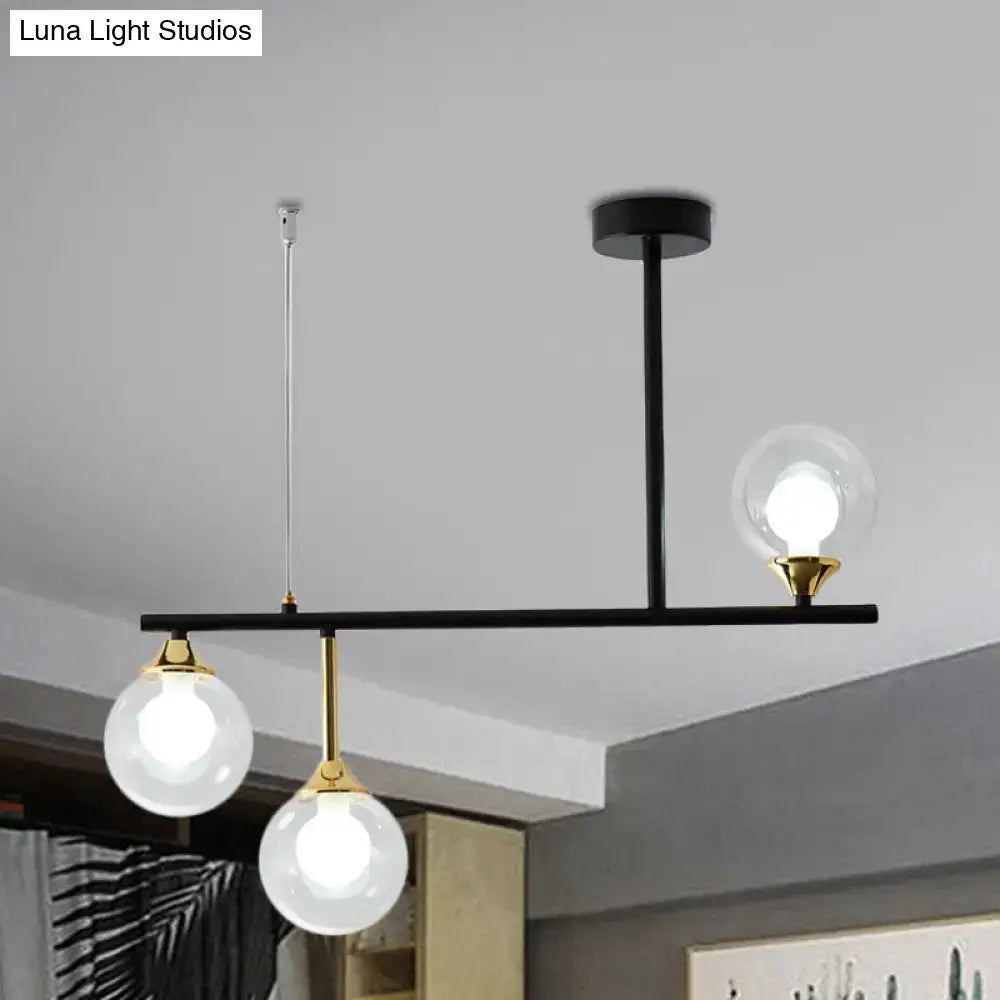 Modern black and gold globe pendant light for dining room
