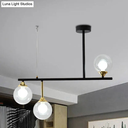 Modern black and gold globe pendant light for dining room